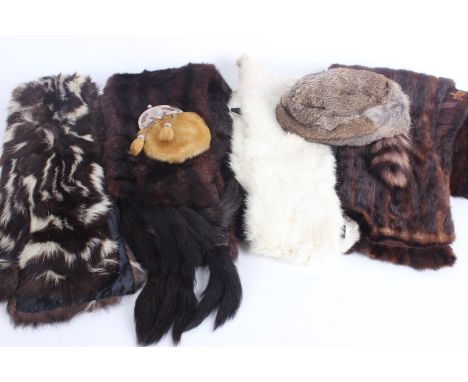 A 1930s/1940s fur clutch bag; an animal pelt stole, a pale coloured fur and white metal sporran, a rabbit skin hat with a rac