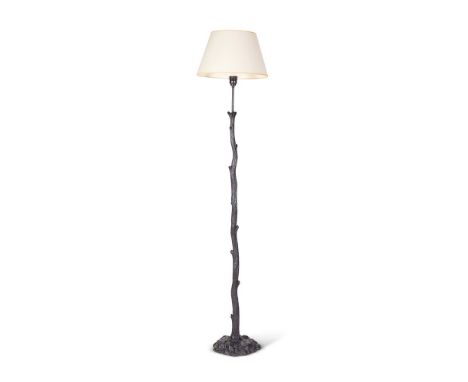 A PATINATED METAL STANDARD LAMP  MODERN, IN THE MANNER OF GIACOMETTI  In the form of a slender tree trunk  141cm high incl fi