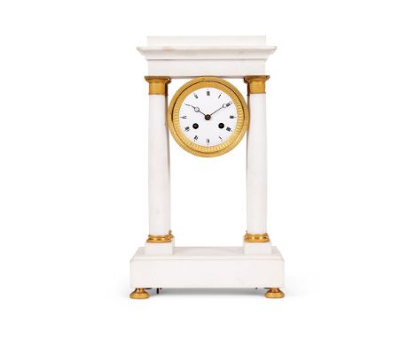 A FRENCH WHITE MARBLE AND GILT METAL MOUNTED PORTICO MANTEL CLOCK MID 19TH CENTURY  With gilt metal capitals, the white ename