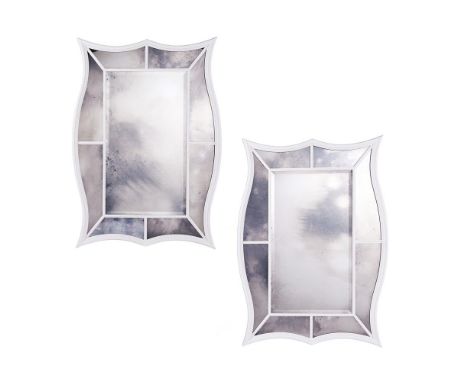 A PAIR OF WHITE PAINTED MARGINAL WALL MIRRORS  CONTEMPORARY  With shaped Adam style frames    Each 101cm high, 71cm wide   Pr