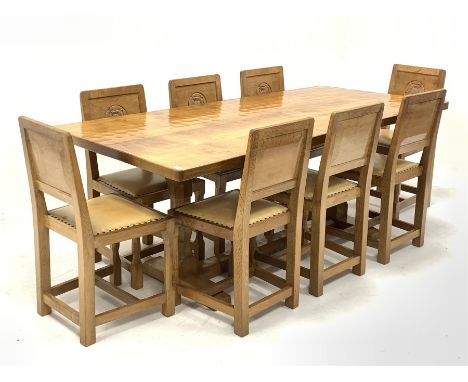 'Eagleman' rectangular oak refectory dining table, adzed top on octagonal shaped supports connected by single floor stretcher