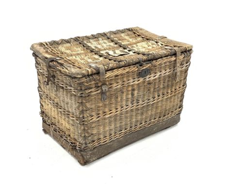 Large early 20th century wicker basket trunk, leather bound with cow hide, fitted with metal lock and hinges, leather straps 