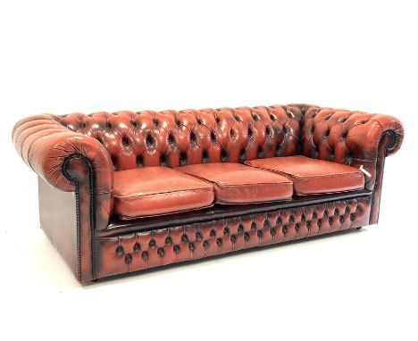 Late 20th century three seat chesterfield sofa upholstered in deeply buttoned red leather, W197cm - Condition Report 