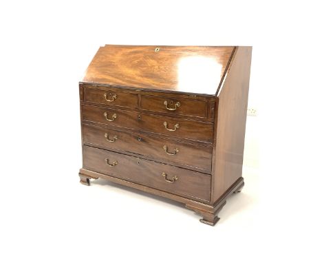  George III mahogany bureau, fall front revealing interior fitted with cupboard, cubbies drawers and baize lined surface, ove