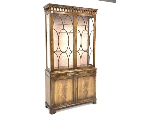 Reproduction mahogany Georgian style display cabinet, projecting dentil cornice above arcade frieze, two astragal glazed door