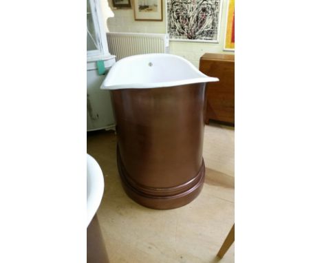 Hand beaten steel slipper bath with pedestal style base, enamelled on the inside, and electroplated with copper on the outsid