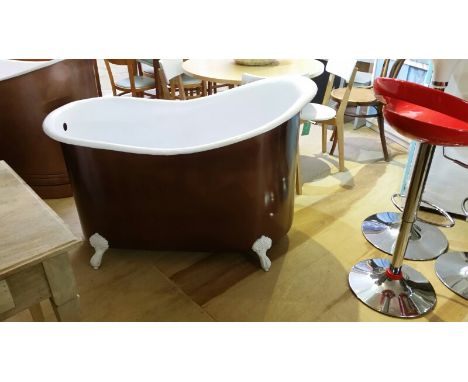 Hand beaten steel slipper bath with claw feet, enamelled on the inside, and electroplated with copper on the outside 71 x 130