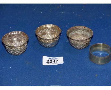 Three Victorian silver salts, London 1888 and a sterling silver napkin ring.