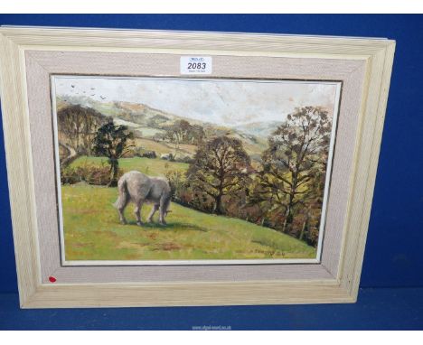 A framed oil on board of a grey horse grazing and rolling hills in the distance, signed lower right R. Thomas '84.