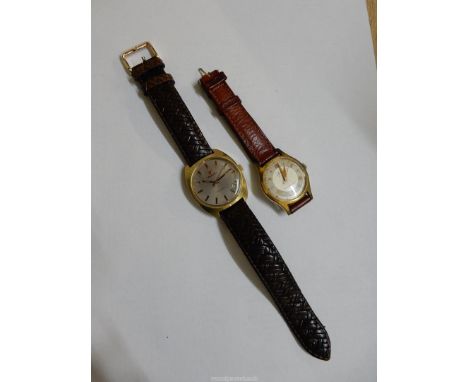 A Zenith Automatic gentleman's wristwatch having baton hour markers, a date window between the 4 &amp; 5 o'clock positions an