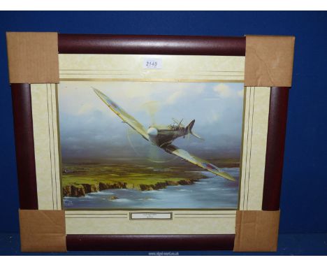 A framed print by Barry Price 'Coastal Patrol Spitfire'.