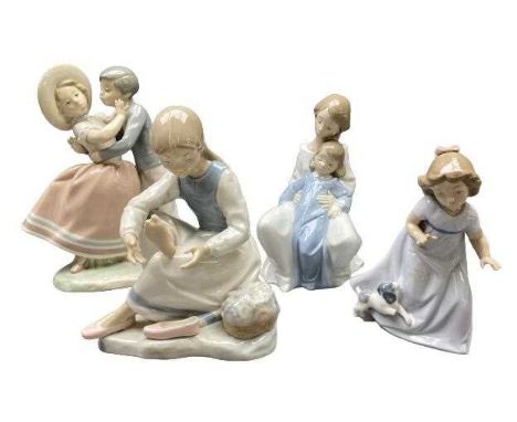 LLADRO FIGURE OF A YOUNG BOY &amp; A GIRL EMBRACING - 25cms tall, two Nao figures and an unmarked similar figure