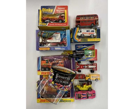 DIECAST VEHICLES - bubble packed Matchbox Superkings cement mixer, crane, ETC,  Corgi ambulance in bubble pack, Dinky convoy 