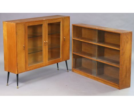 A light oak side cabinet fitted two plate-glass shelves enclosed by a pair of glazed doors, flanked by a cupboard to either e