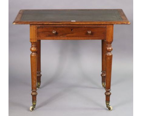 A Victorian mahogany writing table inset gilt-tooled green leather top fitted frieze drawer, & on four turned tapered legs wi