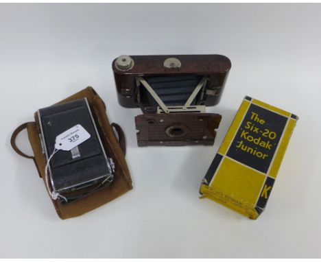 A collection of vintage cameras to include a No II Hawkette, Bakelite example, No Six-20 Kodak Junior with its box and anothe