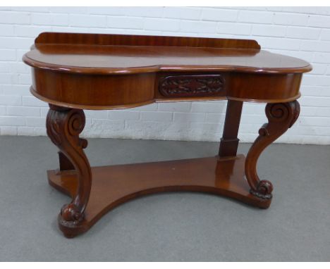 Victorian mahogany console table with a serpentine top on acanthus scrolled supports, with an undertier platform base, 76 x 1