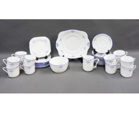 Tuscan china blue and white teaset, with art nouveau pattern, 12 cups, 112 saucers, 10 side plates, sugar bowl, cream jug and