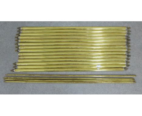 A collection of vintage brass stair rods to include four with plain design and fourteen with fleur de lys finials, (3 finials