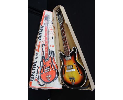 JAPANESE TINPLATE GUITAR - boxed ''Electric Type Deluxe Guitar'' made in Japan by Nomura (T.N Trade Mark).  Guitar in good co