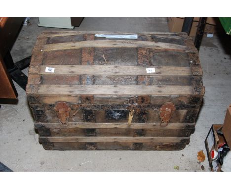 A trunk - domed, wooden and metal.
