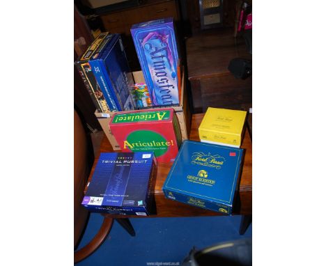 A box of Games - Trivial pursuits, Cribbage board and Hero Quest etc.