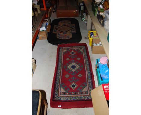 Two rugs hand knot - 67" x 3' and 59" x 28", and a trunk.