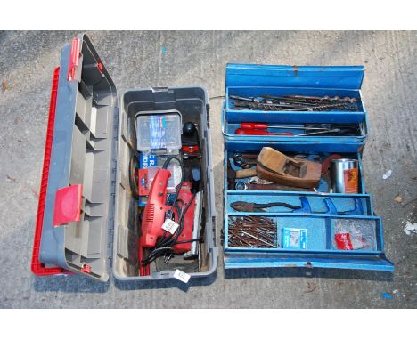 A plastic tool box, cantilever tool ox, screws, champion sander, auger bits for wood, various spanners etc.