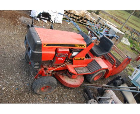 A Westwood T1800 ride on mower with grass collection box, 18HP powered Kohler engine(engine turns).