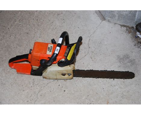 A 'Sthil O21' chainsaw - chain brake working, good compression.