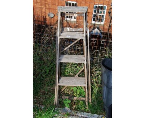 A 4 rung wooden step ladder.
