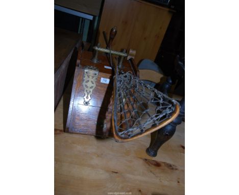 A Mahogany and brass coal bucket with shovel and a Lacrosse stick.