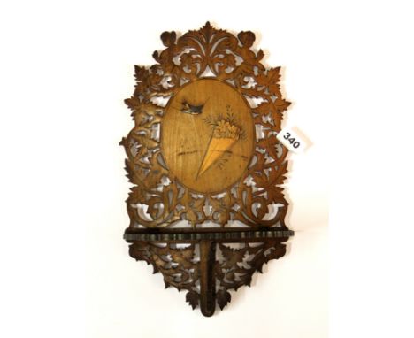 A 19th Century fretwork wall bracket, H. 38cm.