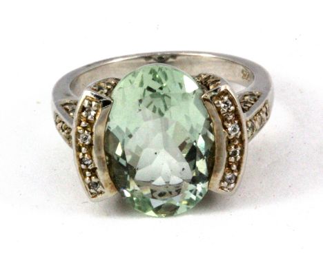 A 925 silver green amethyst and white stone set ring, (N.5).