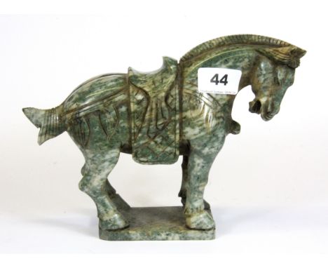 A Chinese carved jade/ hardstone model of a horse, H. 17cm.