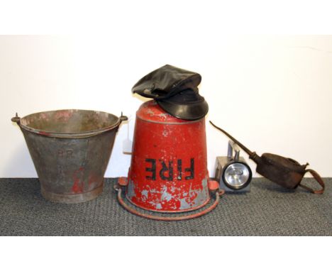 Railway Interest. A railway fire bucket, a steam engine stokers cap, oil can, signalling lamp and a further bucket.