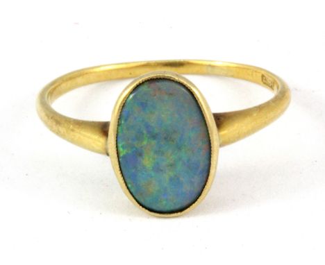 An 18ct yellow gold opal doublet set ring, (O).