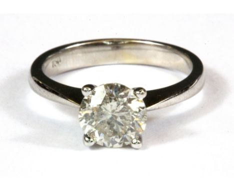 An 18ct white gold (stamped 750) 1.5ct brilliant cut diamond set solitaire ring, (L).