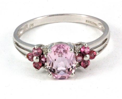 A 9ct white gold ring set with morganite, pink tourmaline and diamond set shoulders, (T.5).