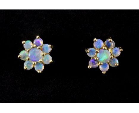 A pair of 9ct yellow gold opal set cluster earrings, Dia. 1cm.