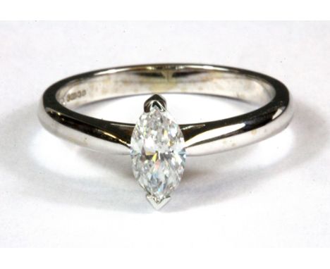 An 18ct white gold marquise cut diamond set solitaire ring, approx. 0.50ct, (O).