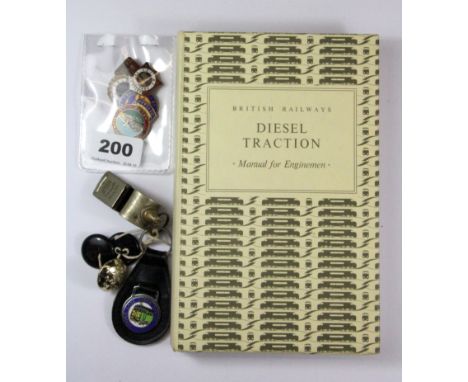 A quantity of railway related badges, whistle and 'Diesel Traction' manual.