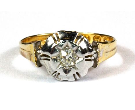 An 18ct yellow and white gold diamond set solitaire ring, (K).