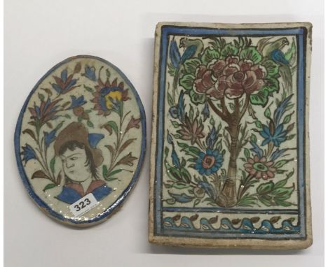 Islamic interest. Two hand painted Eastern ceramic tiles, 22 x 33cm, 20 x 26cm.
