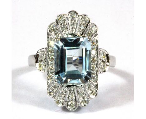 An Art Deco style 18ct white gold aquamarine and diamond set ring, 2.8ct aqua, 0.54ct diamonds, (N).