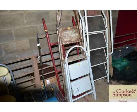 An aluminium step ladder and set of steps