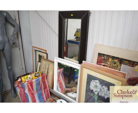 A faux leather framed oblong wall mirror together with a white painted wall mirror