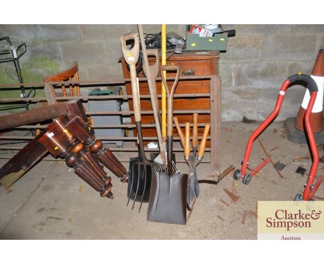 A quantity of long handled gardening tools etc.