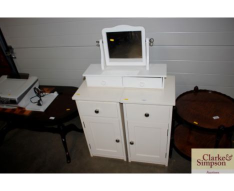 A pair of bedside cupboards fitted single draw with a dressing table mirror fitted two drawers