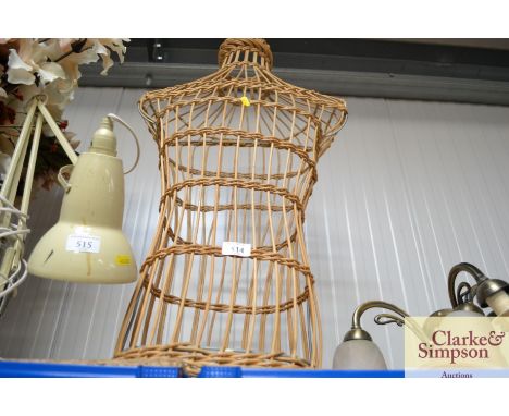 A wicker mannequin